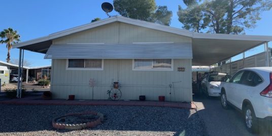 Senior Park w/ security guard has Doublewide 3 Br 2 Ba on corner lot REDUCED to $29,900